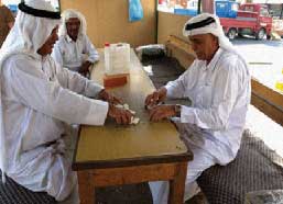 Men playing dominos